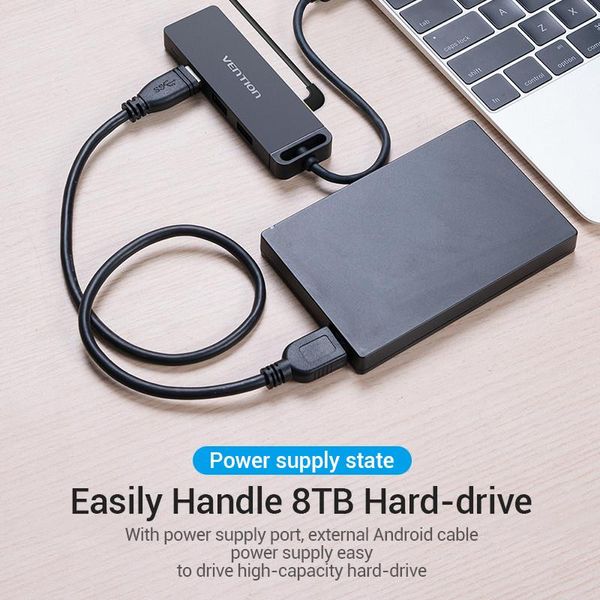 Концентратор Vention 4-Port з micro USB живленням 0.15M Black (TGKBB) 484148 фото